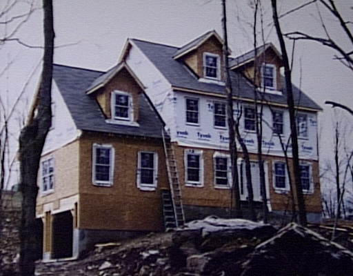 Lot 2 Welsh Road Sutton, MA 01590 - Photo 1 of 1 a front view of a house with a street