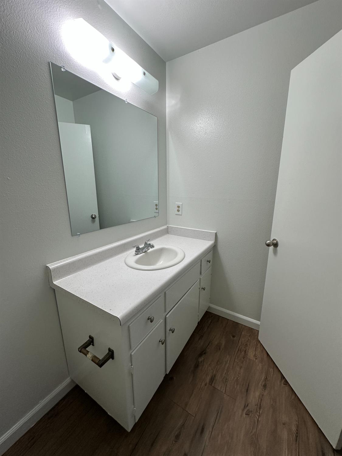 1069 Cherry Lane, Unit D Clovis, CA 93612 - Photo 17 of 18 a utility room with cabinets washer and dryer
