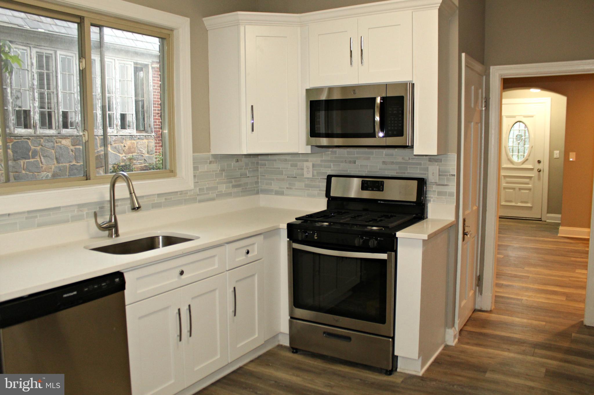 3608 Dennlyn Road Baltimore, MD 21215 - Photo 4 of 26 New kitchen with quartz counter tops!