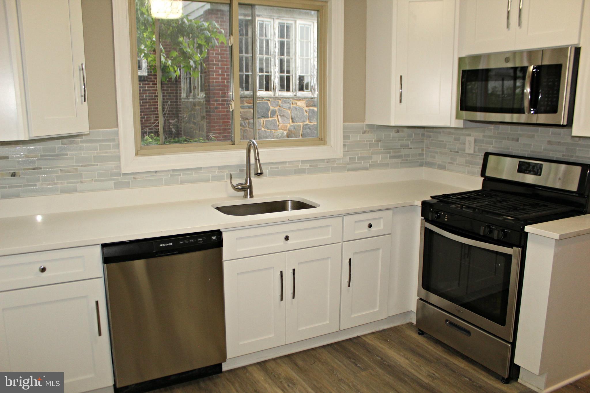 3608 Dennlyn Road Baltimore, MD 21215 - Photo 5 of 26 New kitchen with quartz counter tops!