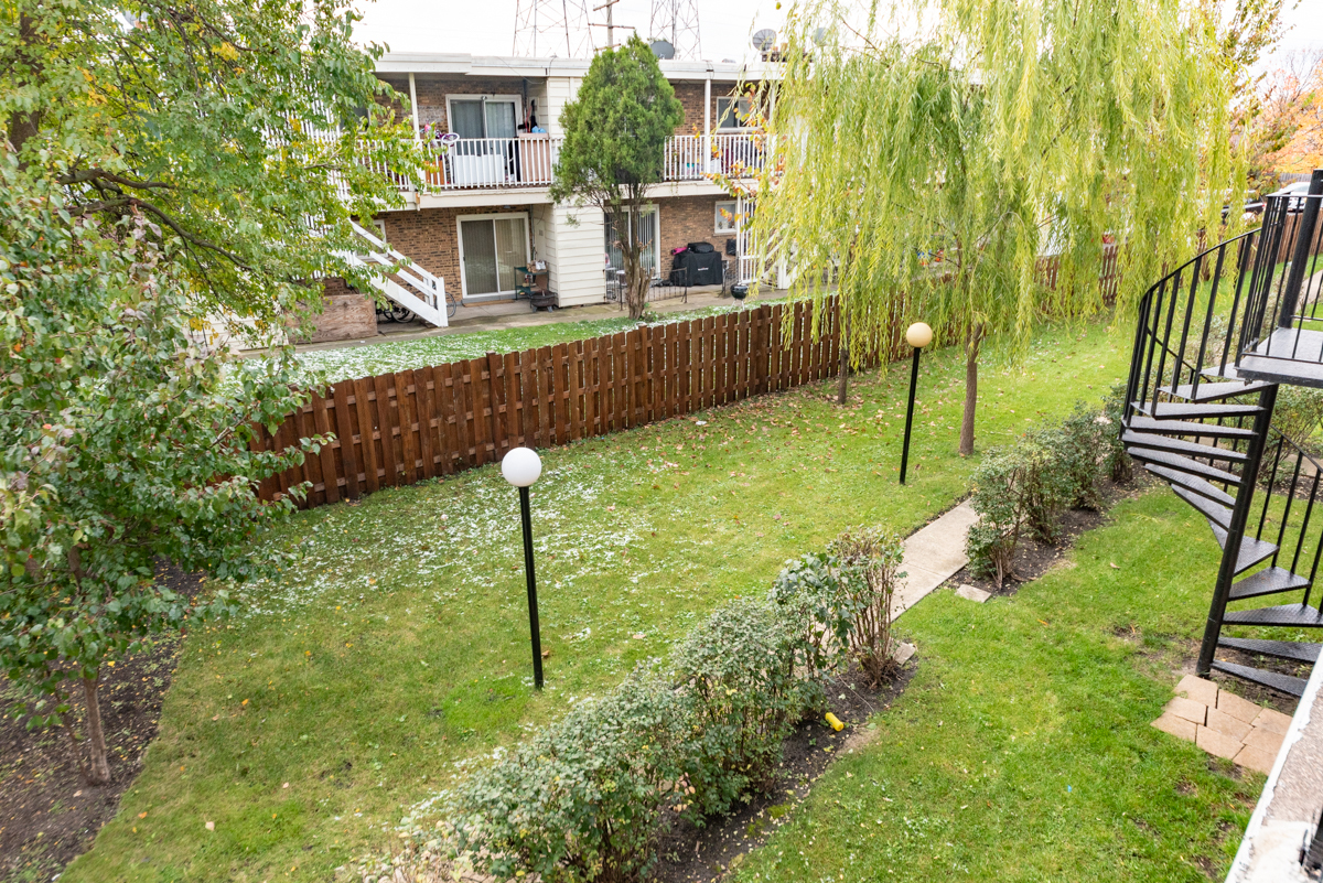 9450 Washington Road, Unit 4B Morton Grove, IL 60053 - Photo 16 of 16 a view of house with backyard