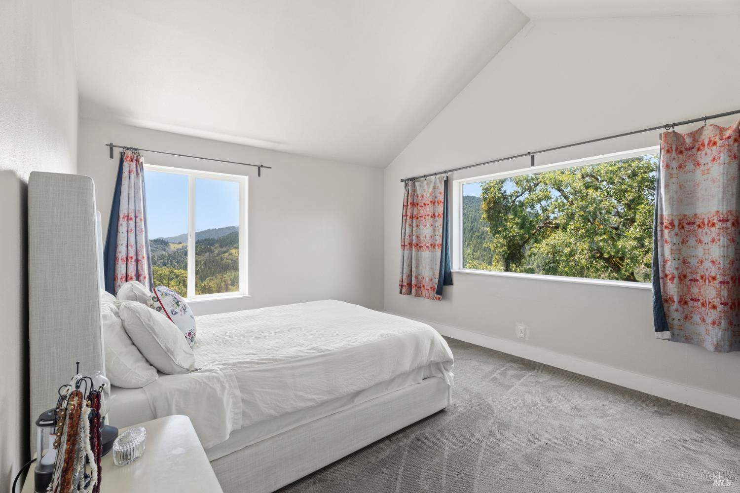 14590 Ridgeview Road Willits, CA 95490 - Photo 13 of 37 a bedroom with a bed and a large window