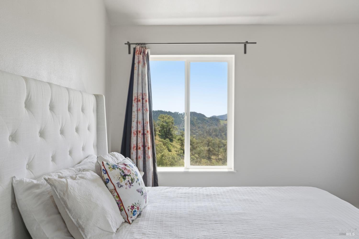 14590 Ridgeview Road Willits, CA 95490 - Photo 14 of 37 a bedroom with a bed and a window
