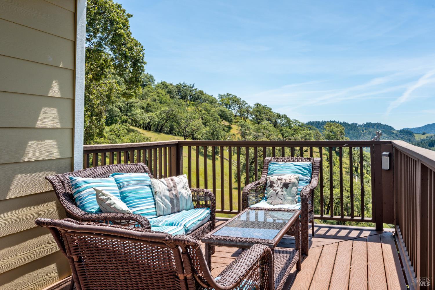 14590 Ridgeview Road Willits, CA 95490 - Photo 19 of 37 a view of a balcony with wooden floor and outdoor seating