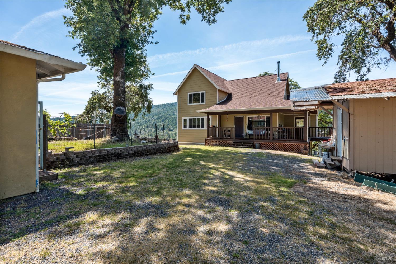14590 Ridgeview Road Willits, CA 95490 - Photo 25 of 37 a view of a house with a yard