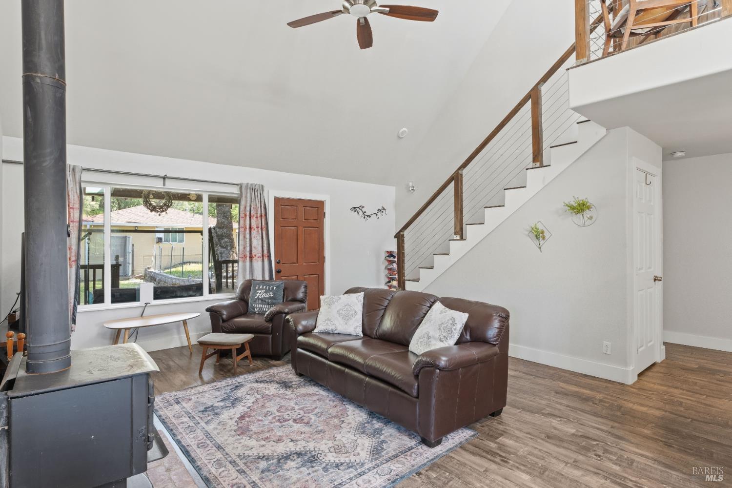 14590 Ridgeview Road Willits, CA 95490 - Photo 3 of 37 a living room with furniture and wooden floor