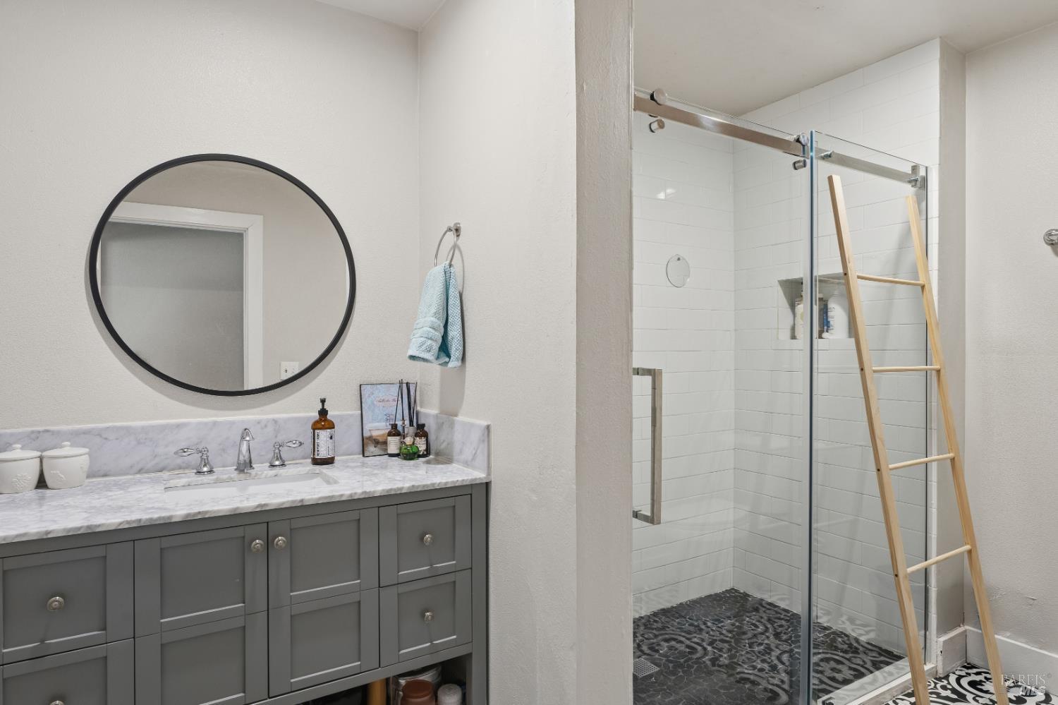 14590 Ridgeview Road Willits, CA 95490 - Photo 10 of 37 a bathroom with a granite countertop sink a mirror and shower