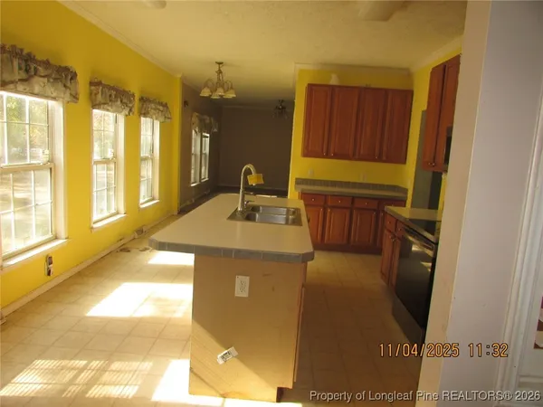 a bathroom with a sink a vanity and a mirror