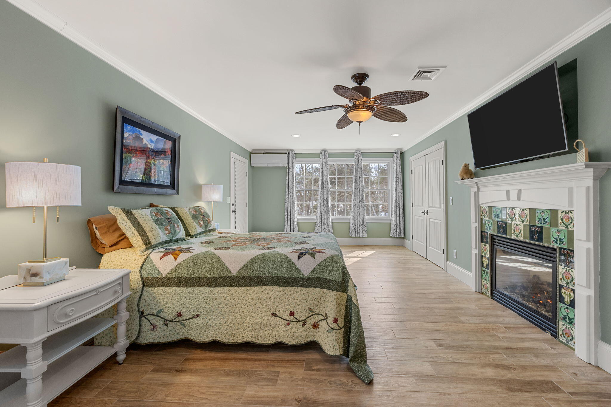 9 Horseshoe Bend Way Mashpee, MA 02649 - Photo 25 of 60 a spacious bedroom with a bed and a flat screen tv