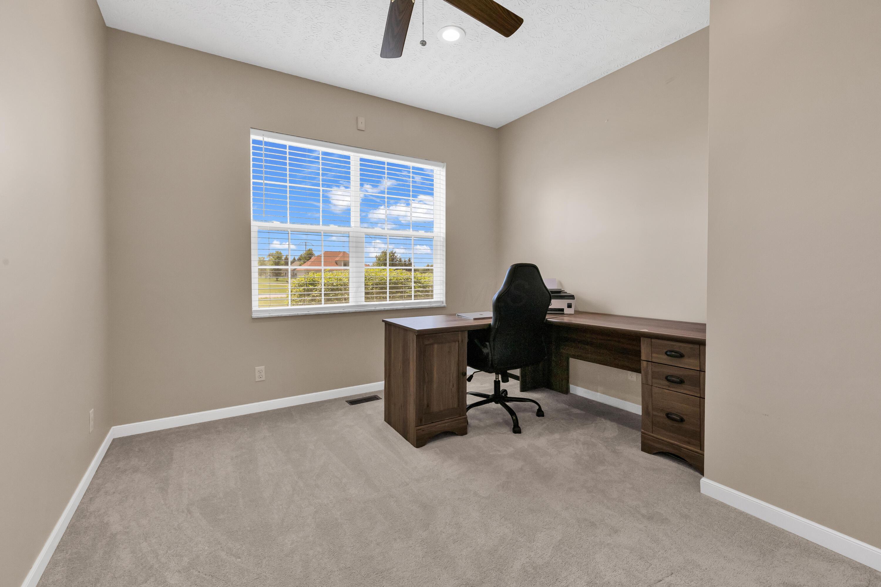 14396 Blamer Road Johnstown, OH 43031 - Photo 26 of 48 • Light sand carpet
• Ivory painted walls
• Can lighting
• Ceiling fan
• 2” blinds