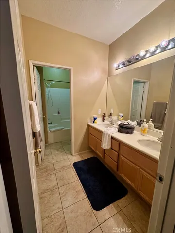 a room with a closet and a wooden floor