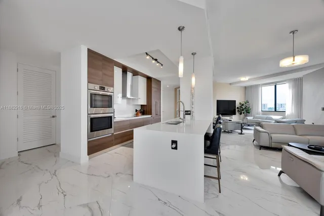 a large white building with kitchen view