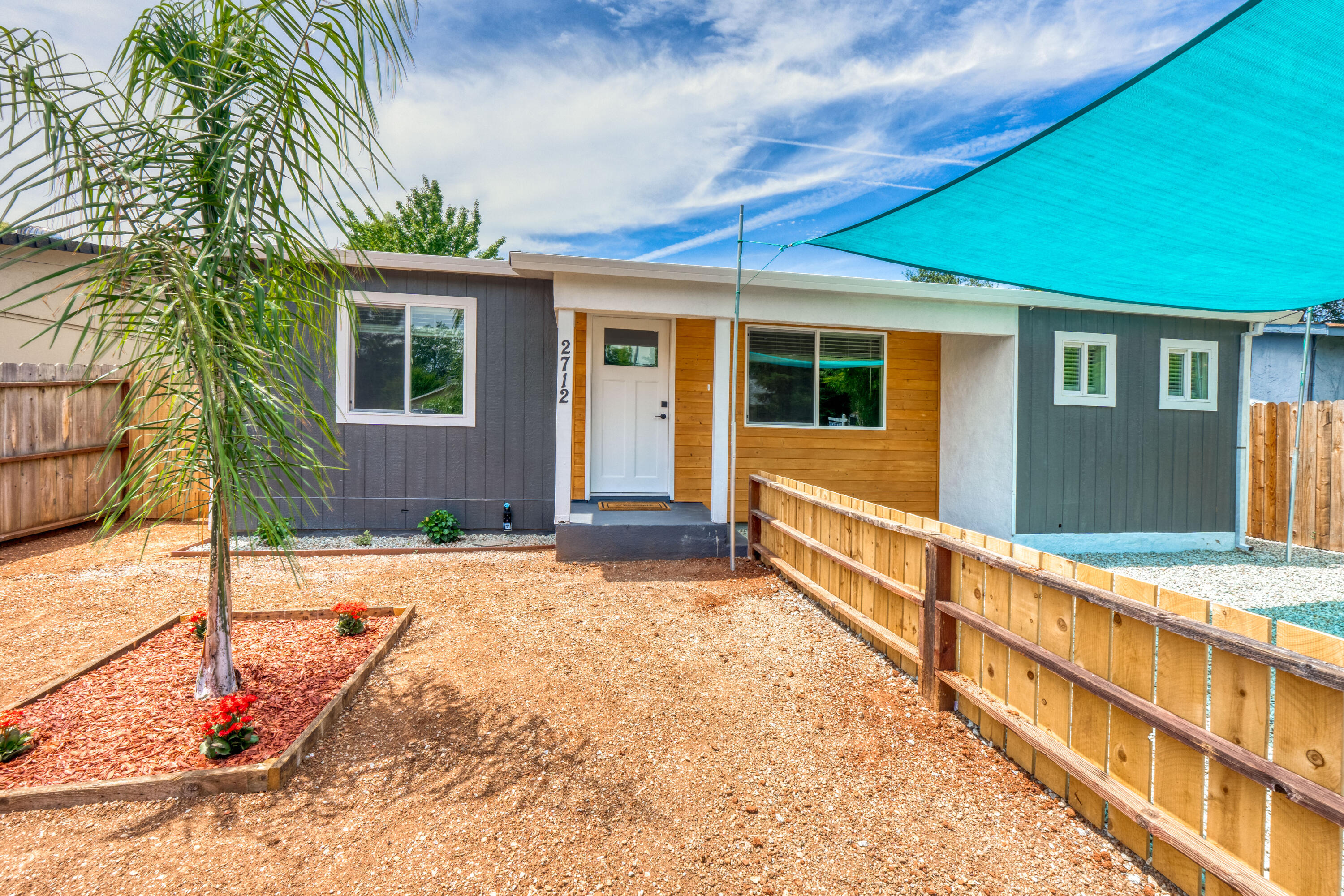2712 Irwin Road Redding, CA 96002 - Photo 4 of 34 a view of house with backyard and trees