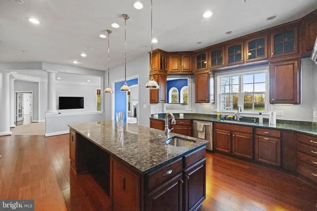 a bathroom with a bathtub and a window