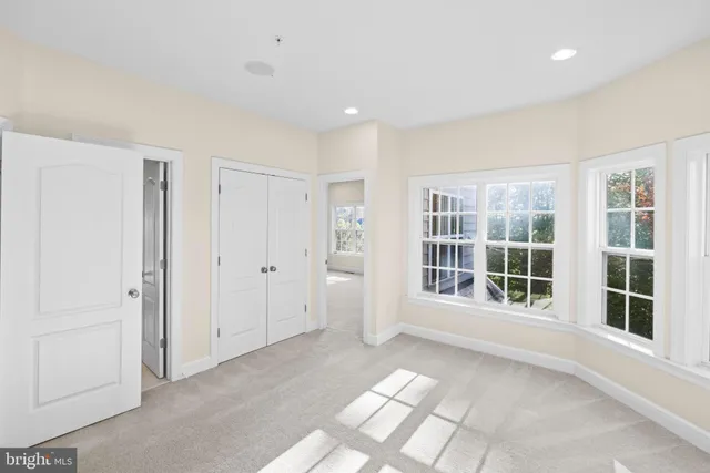 a view of a balcony with chairs
