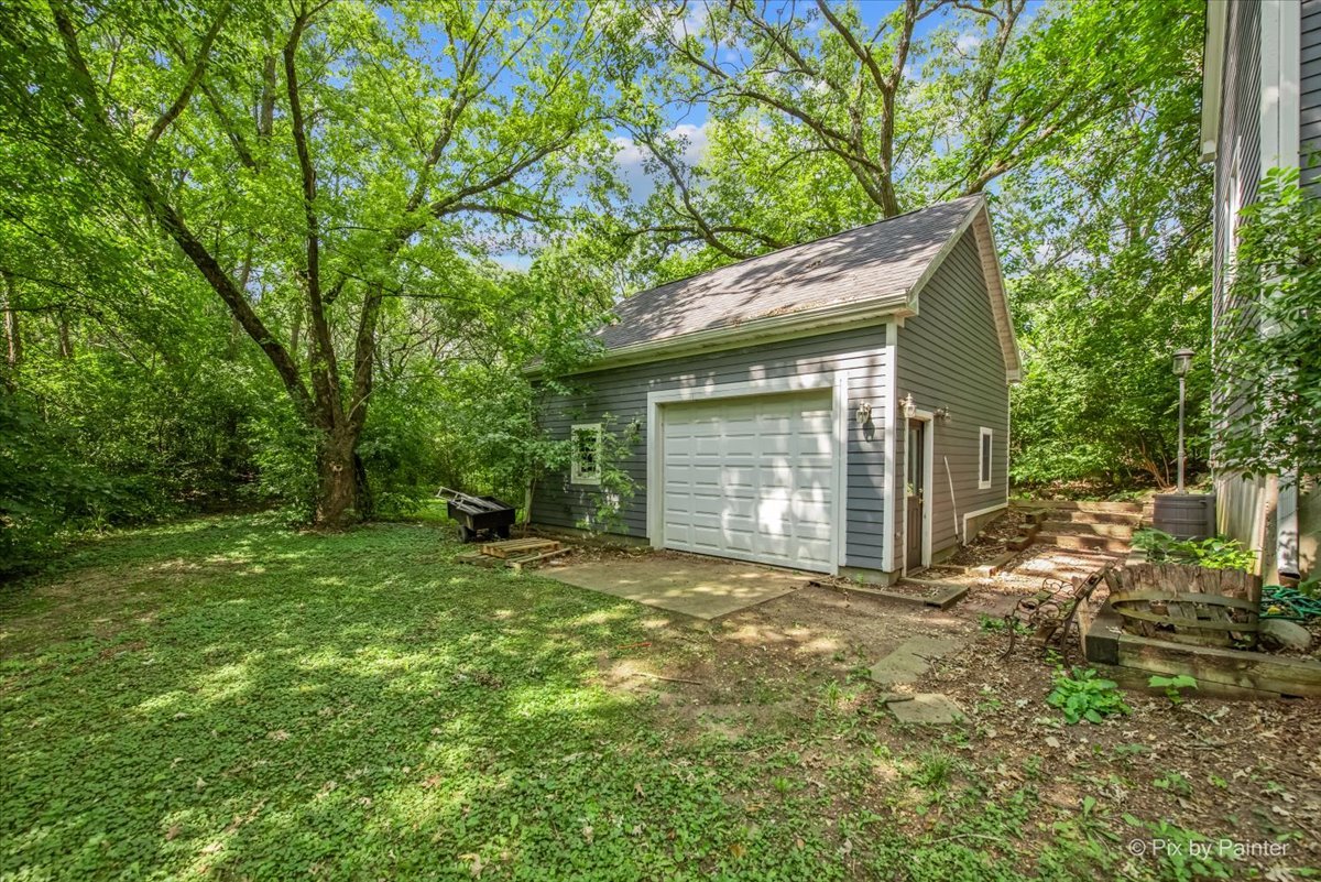 144 Algonquin Road Barrington Hills, IL 60010 - Photo 41 of 53 a view of a house with a yard