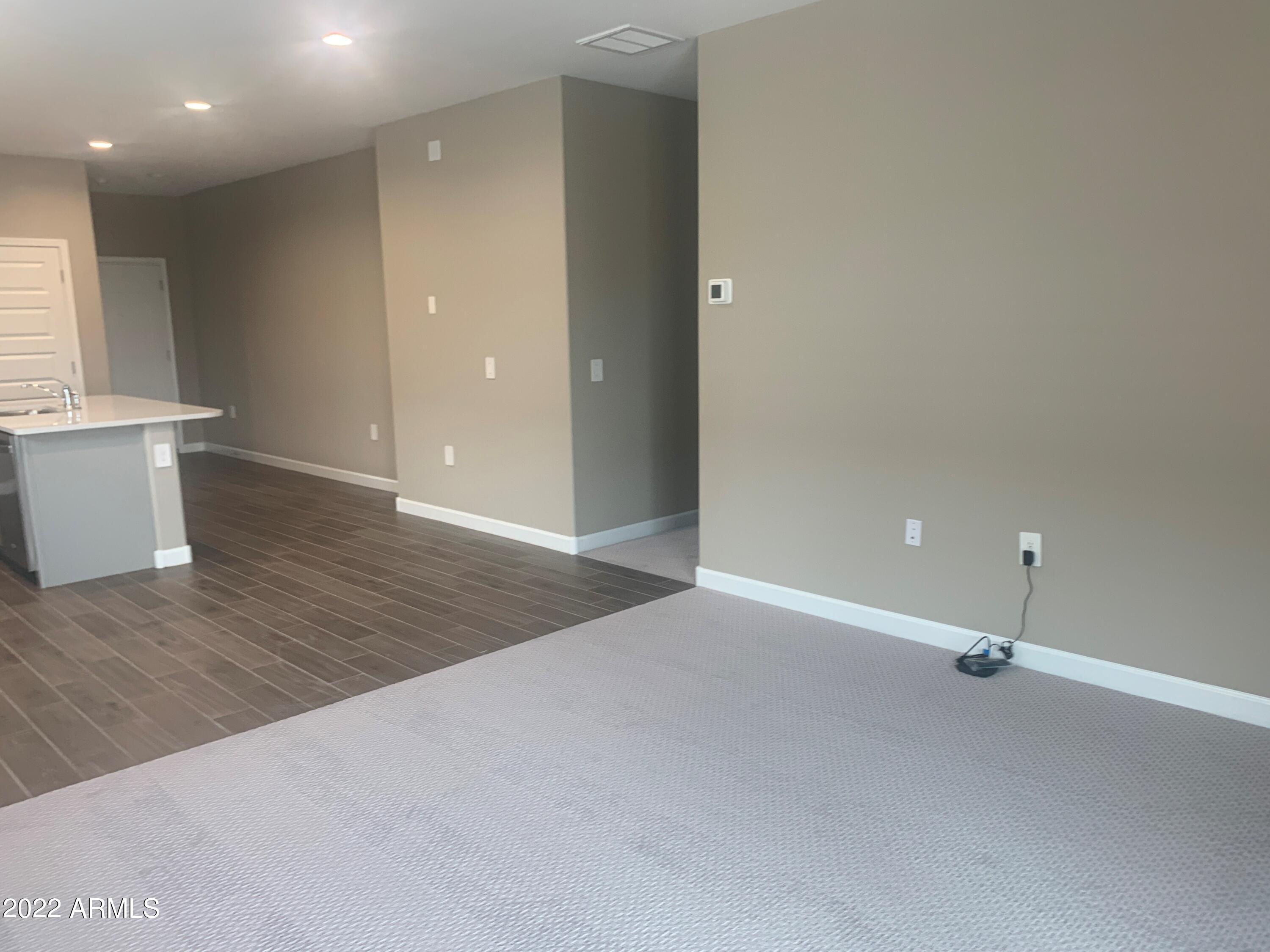 23944 West Ripple Road Buckeye, AZ 85326 - Photo 3 of 15 Great room 2