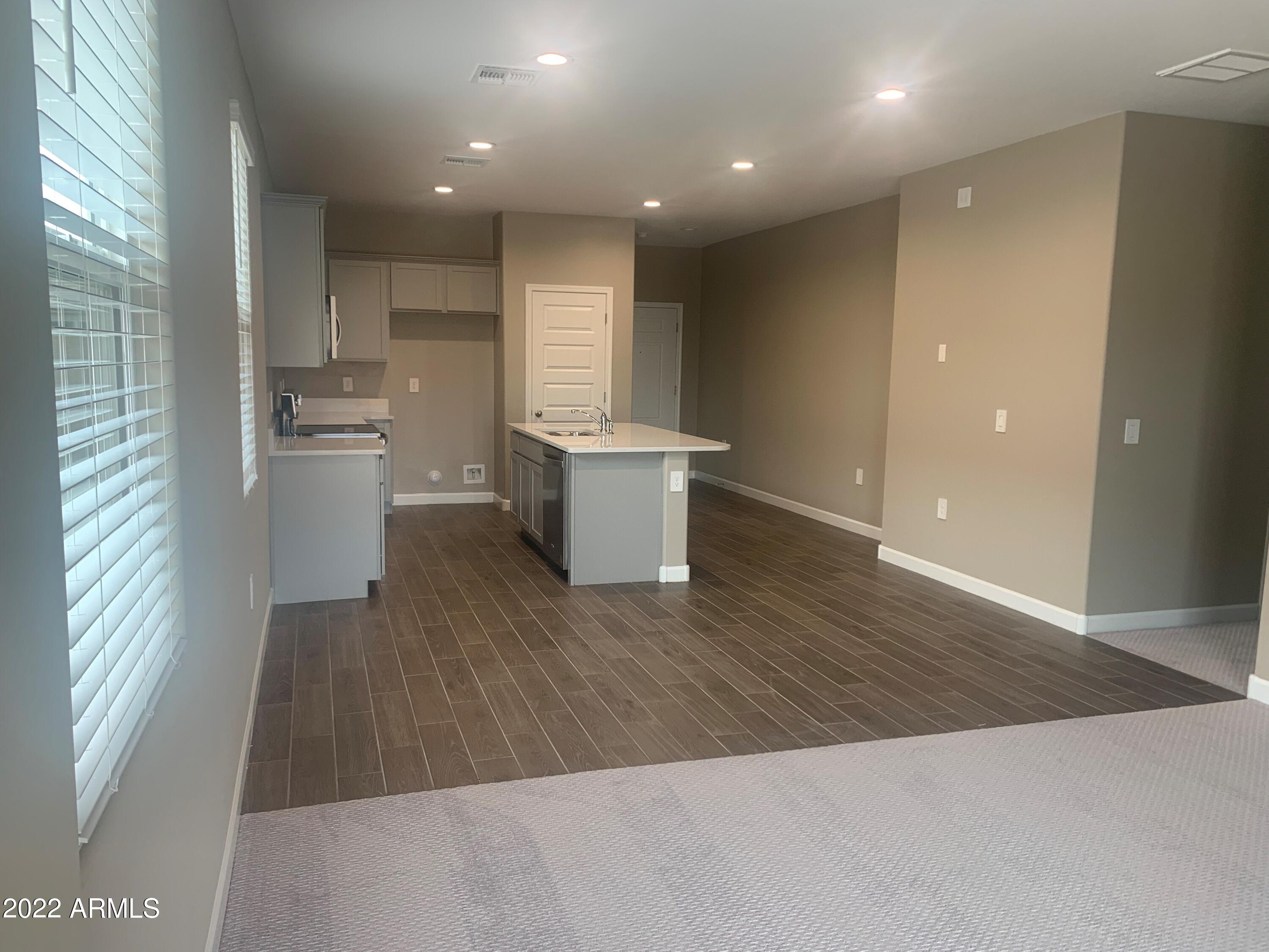 23944 West Ripple Road Buckeye, AZ 85326 - Photo 4 of 15 Great room 3