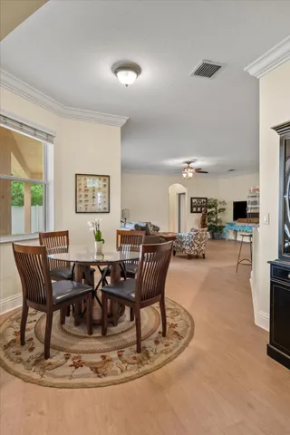 a view of a dining room with furniture