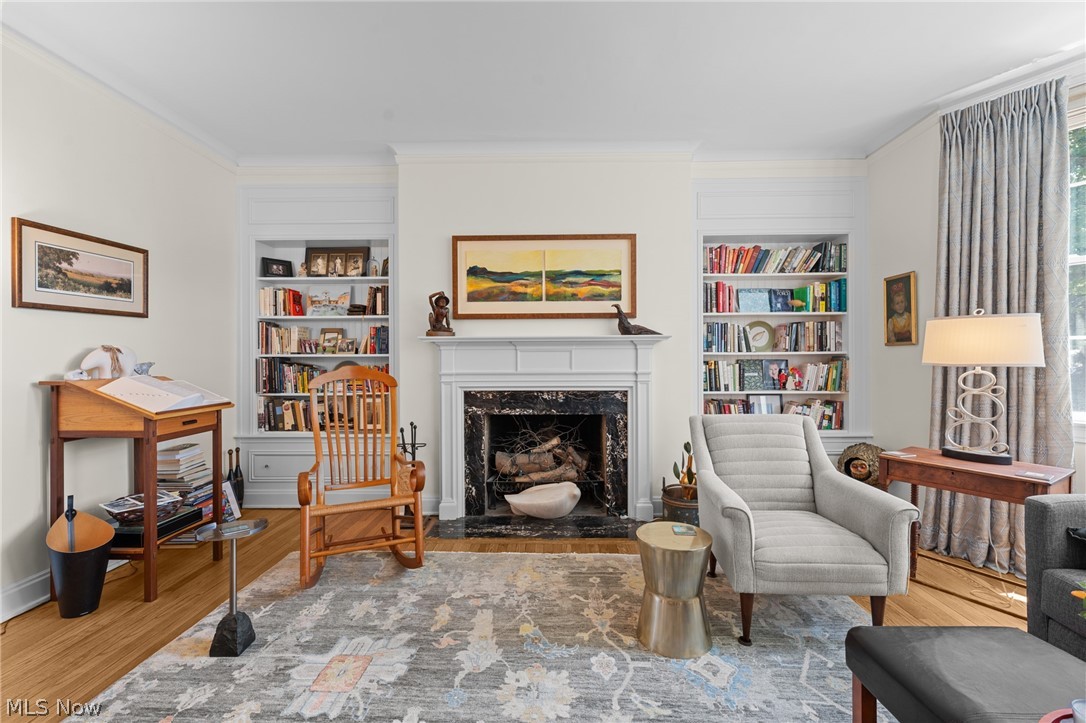 12546 Cedar Road, Unit 4 Cleveland Heights, OH 44106 - Photo 11 of 43 Spacious living room with
hardwood floors, bay window, decorative fireplace flanked with custom built-ins