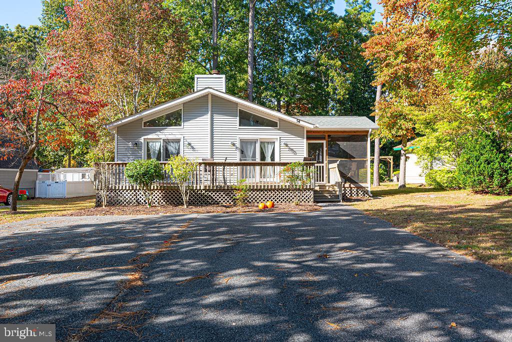 54 Abbyshire Road Ocean Pines, MD 21811 - Photo 1 of 43 a view of a house with a yard and large tree