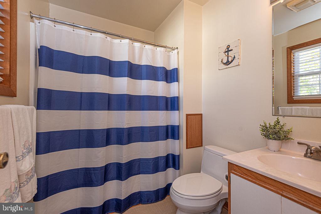 54 Abbyshire Road Ocean Pines, MD 21811 - Photo 14 of 43 a bathroom with a sink toilet and shower