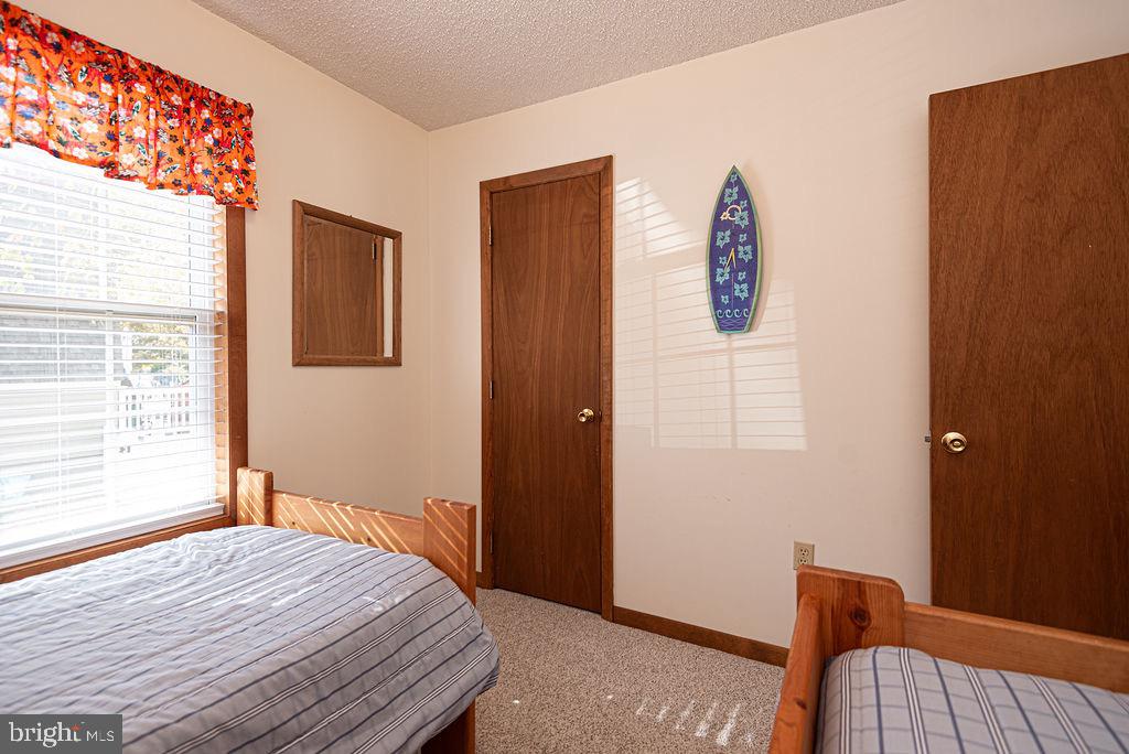 54 Abbyshire Road Ocean Pines, MD 21811 - Photo 23 of 43 a bedroom with a bed and a window