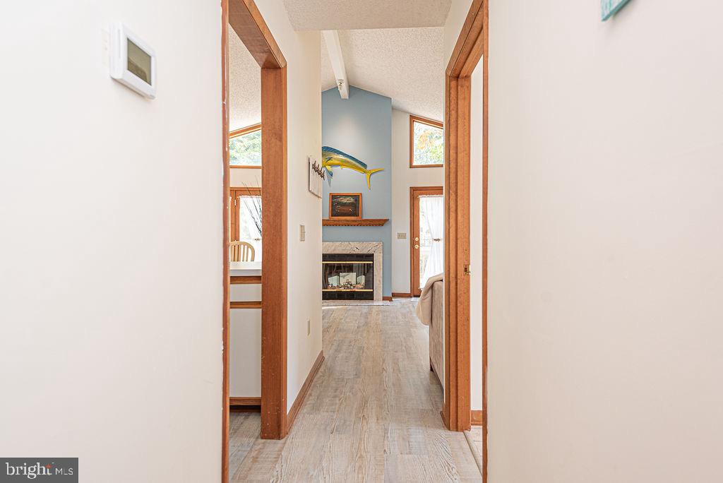 54 Abbyshire Road Ocean Pines, MD 21811 - Photo 24 of 43 a view of a hallway with wooden floor and a bathroom
