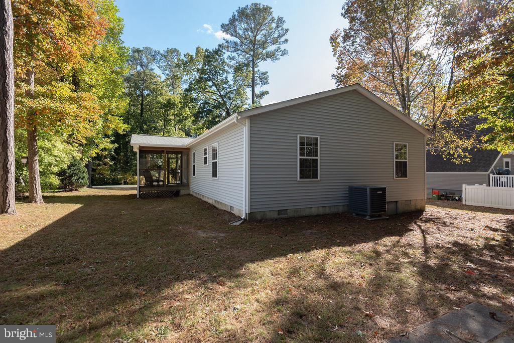 54 Abbyshire Road Ocean Pines, MD 21811 - Photo 29 of 43 a view of a house with a yard covered in snow