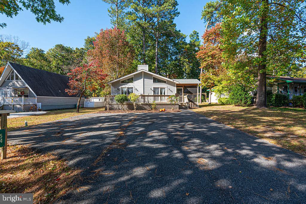 54 Abbyshire Road Ocean Pines, MD 21811 - Photo 32 of 43 a front view of a house with a yard