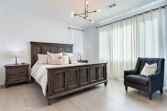 a bed room with a bed and a couch