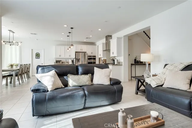 a living room with furniture and a couch