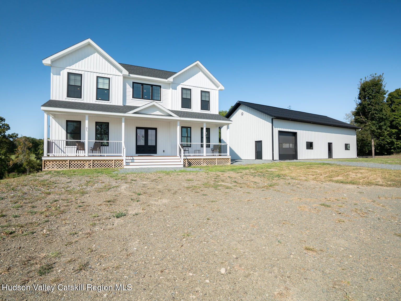 282 Ridge Road Stuyvesant, NY 12156 - Photo 1 of 65 a front view of a house with a garden