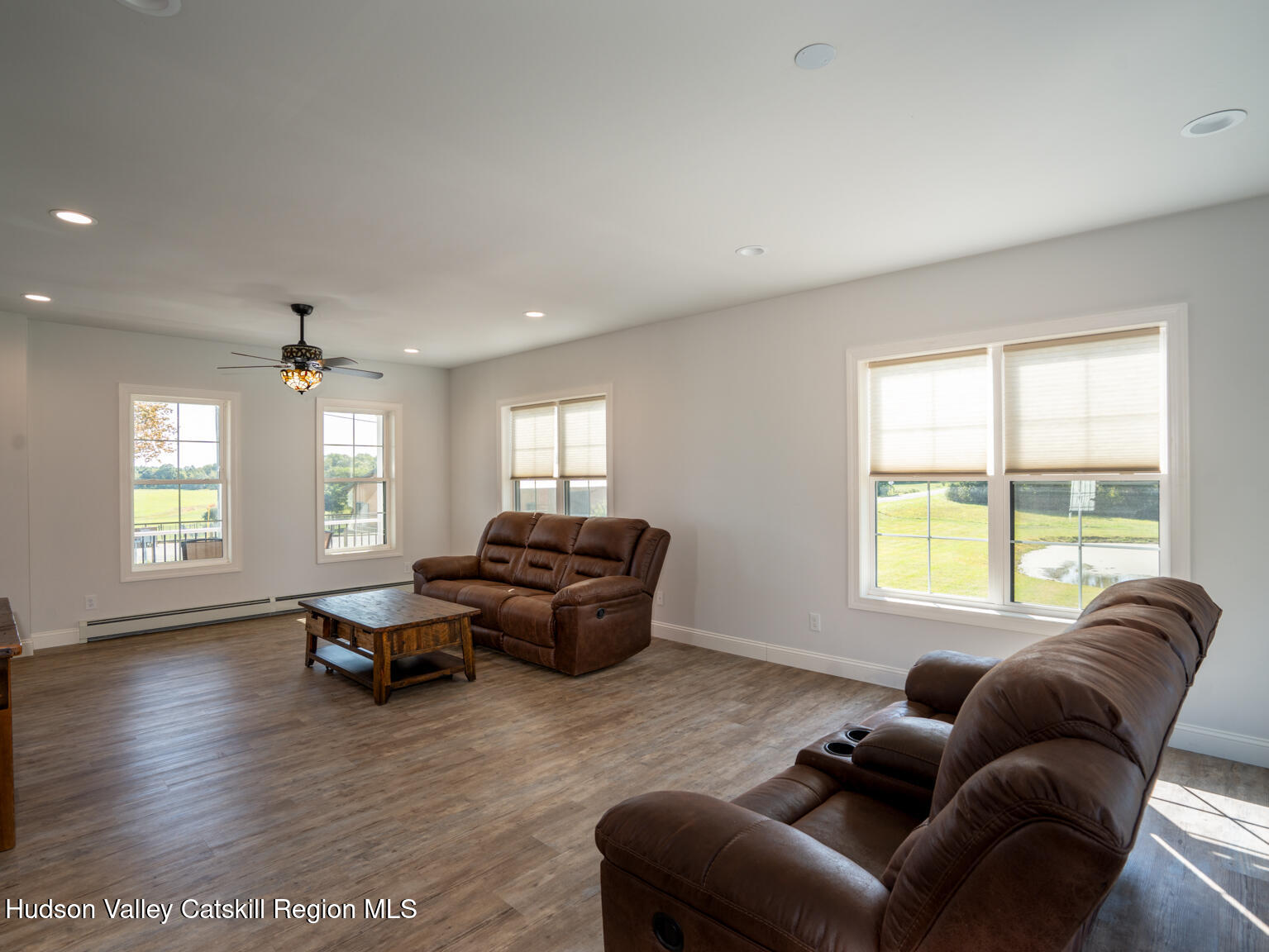 282 Ridge Road Stuyvesant, NY 12156 - Photo 15 of 65 a living room with furniture and wooden floor