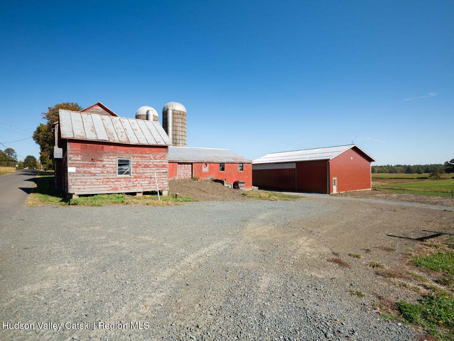 282 Ridge Road Stuyvesant, NY 12156 - Photo 49 of 65 a bedroom with a bed and a night stand