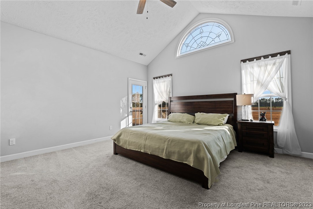 5654 Toby Pl Road Stedman, NC 28391 - Photo 18 of 42 a bedroom with a bed and a window