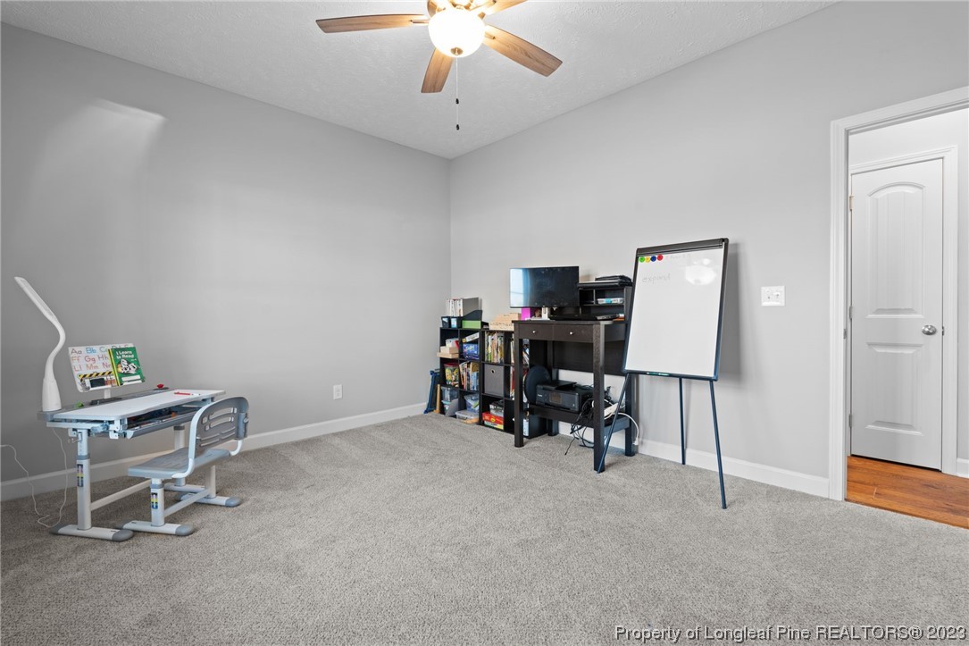 5654 Toby Pl Road Stedman, NC 28391 - Photo 26 of 42 a view of a workspace with furniture