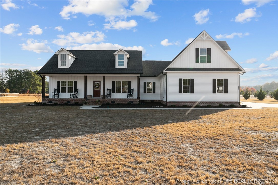 5654 Toby Pl Road Stedman, NC 28391 - Photo 31 of 42 a front view of a house with a yard