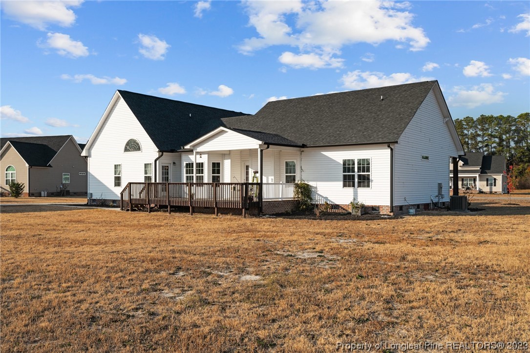 5654 Toby Pl Road Stedman, NC 28391 - Photo 35 of 42 a view of a house with backyard and garden