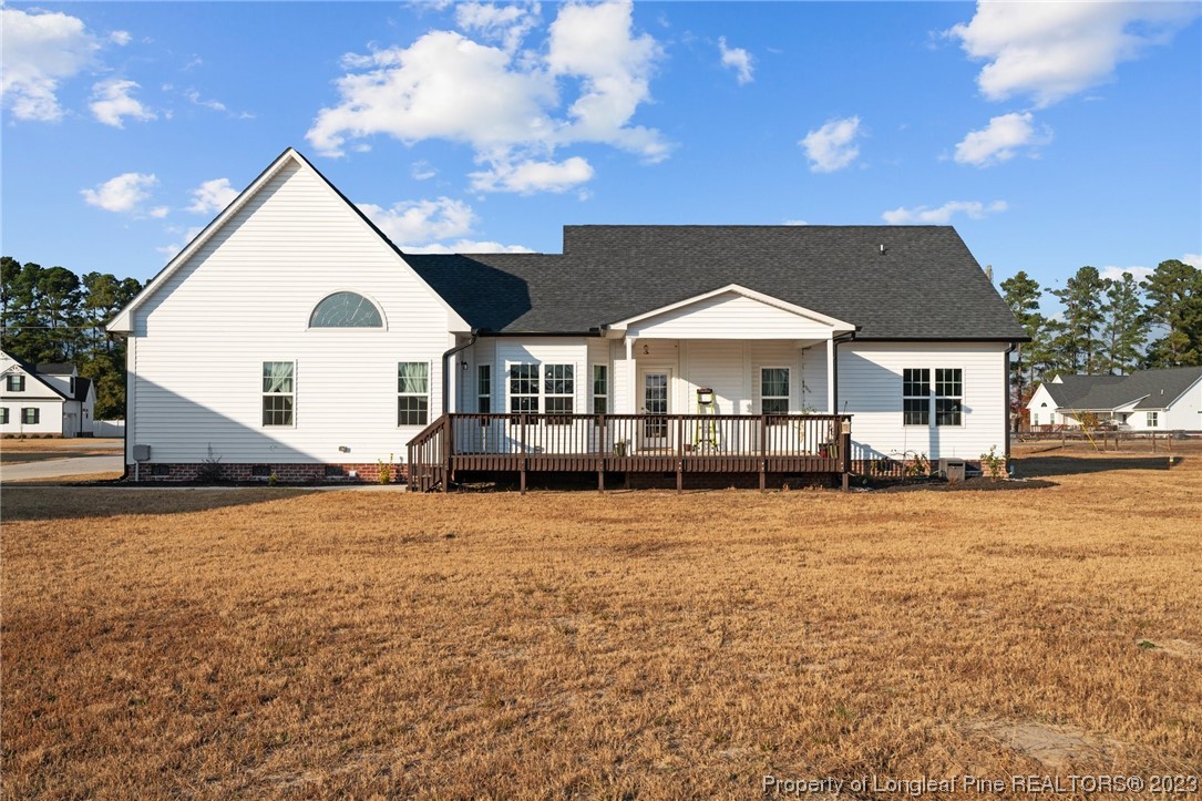 5654 Toby Pl Road Stedman, NC 28391 - Photo 36 of 42 a front view of house with yard and trees in the background