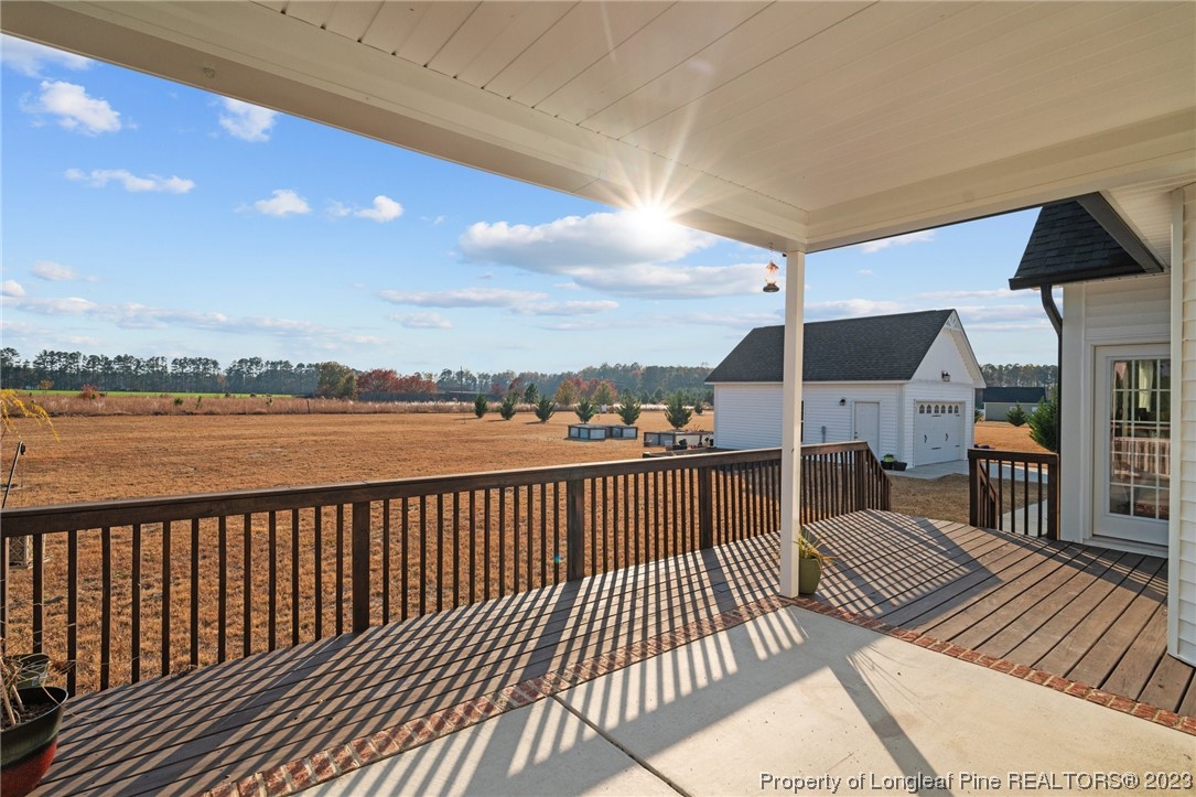 5654 Toby Pl Road Stedman, NC 28391 - Photo 38 of 42 a view of balcony with seating space