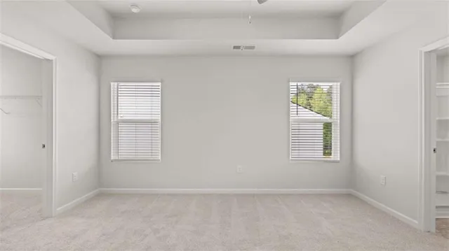 an empty room with windows