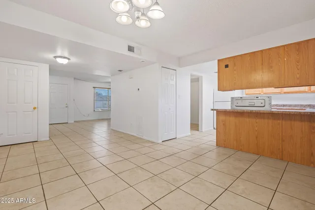 a view of kitchen with washer and dryer
