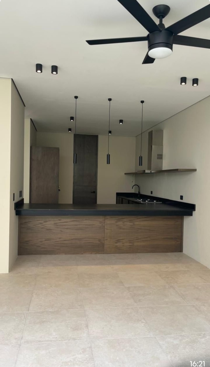 10 Río Residencial Street, Unit 17 Hankamer, TX 77560 - Photo 2 of 12 a view of kitchen and microwave