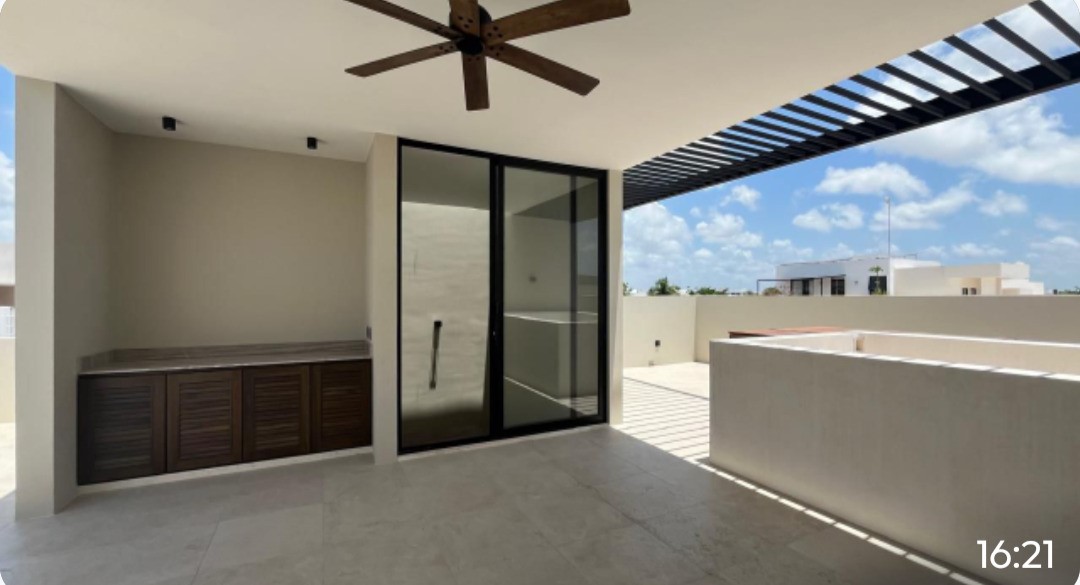 10 Río Residencial Street, Unit 17 Hankamer, TX 77560 - Photo 8 of 12 a view of a big room with wooden floor and a ceiling fan