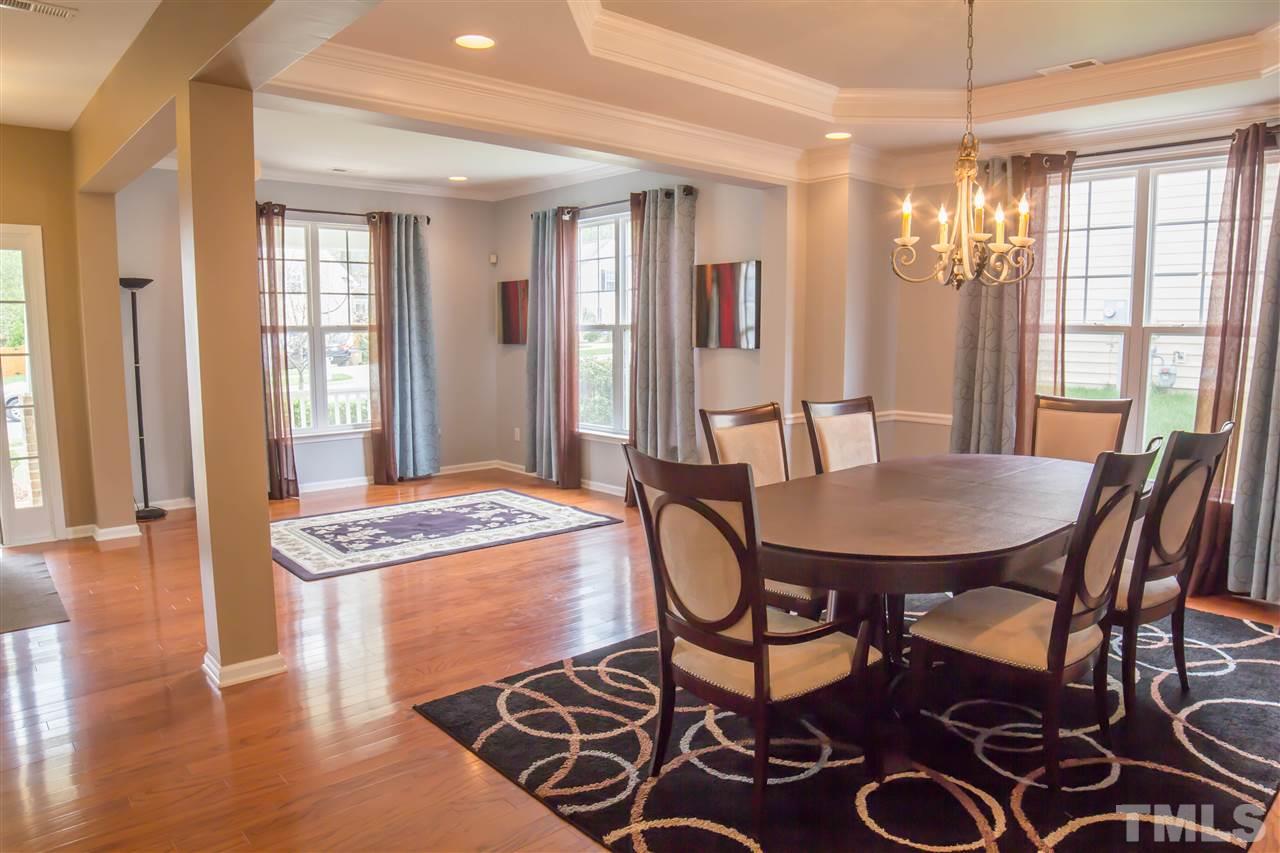 305 Forbes Road Wake Forest, NC 27587 - Photo 24 of 25 Open floor plan formal living with hardwood floors