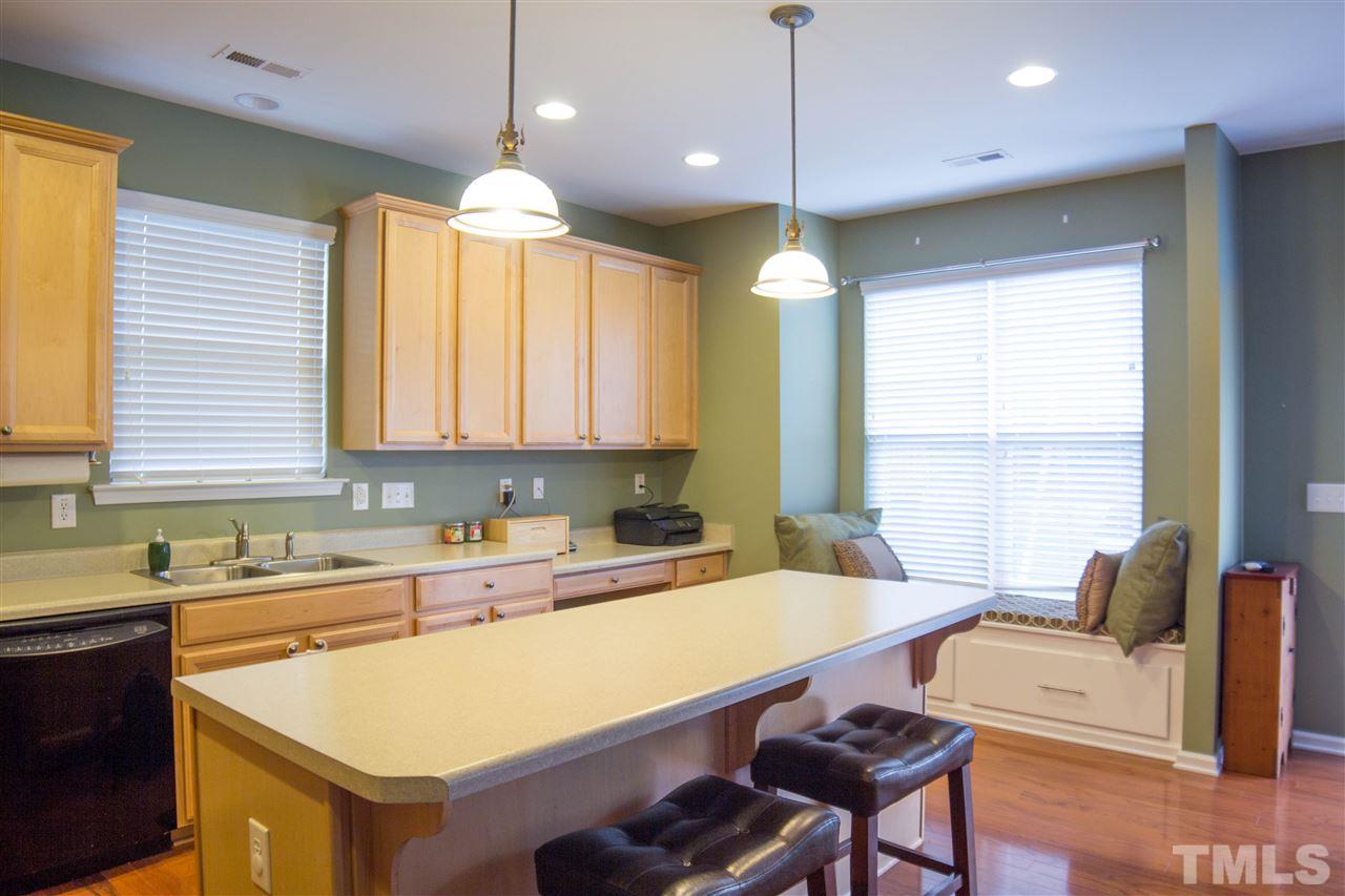 305 Forbes Road Wake Forest, NC 27587 - Photo 6 of 25 Large size entertaining kitchen with bay window with seating area