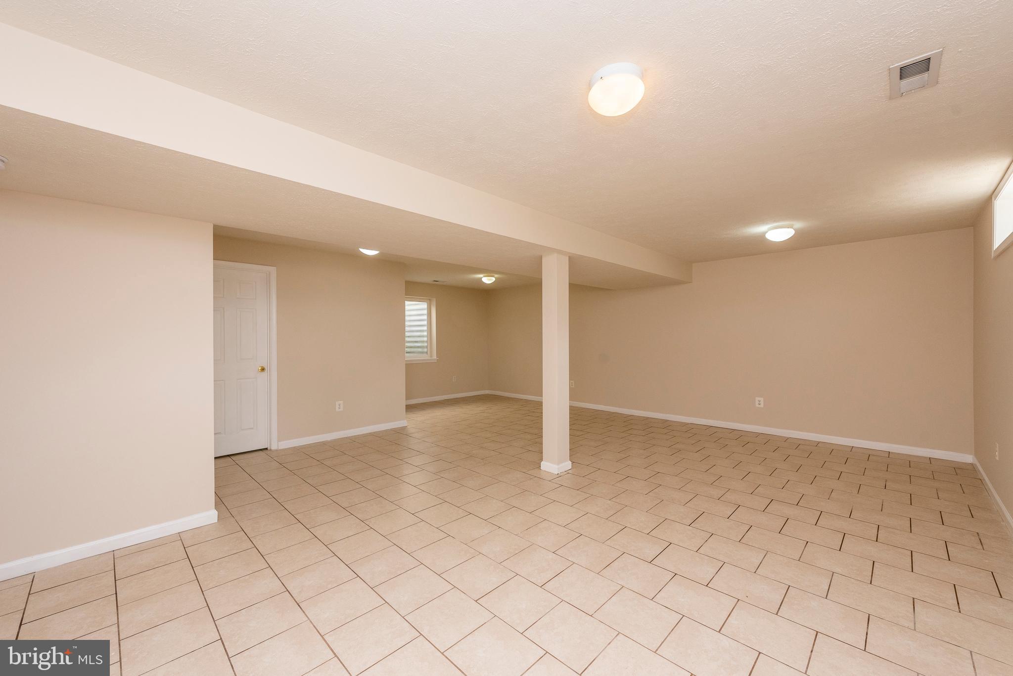 718 MacDill Road Baltimore, MD 21220 - Photo 32 of 34 Lower Level Rec Room
