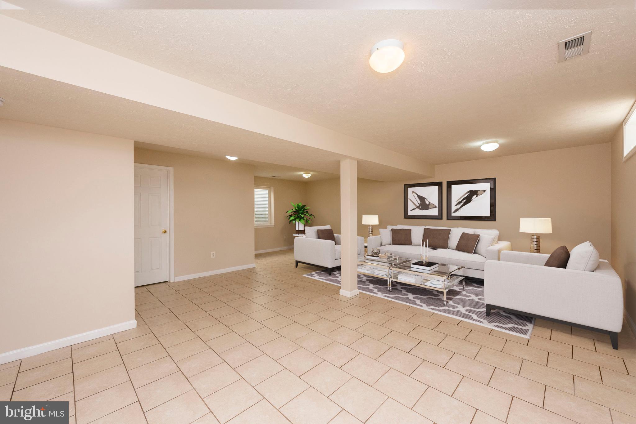 718 MacDill Road Baltimore, MD 21220 - Photo 5 of 34 Virtually Staged Lower Level Rec Room