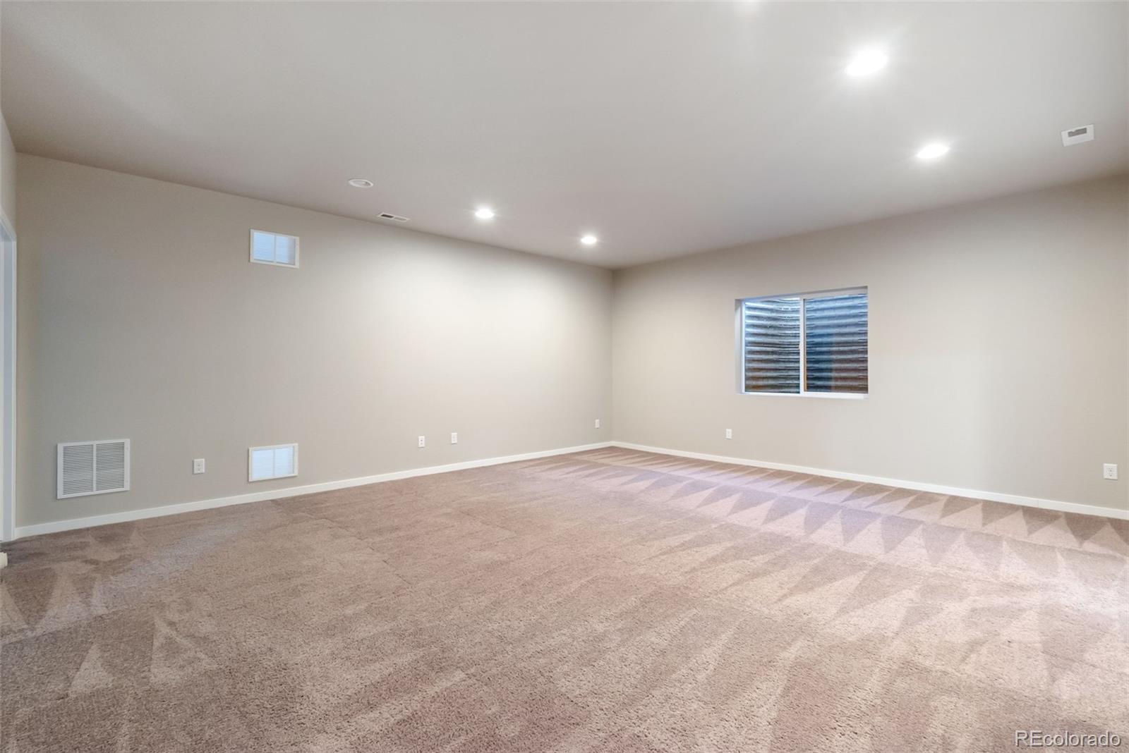 4508 Captain Jack Lane Colorado Springs, CO 80924 - Photo 25 of 50 a view of an empty room with a window